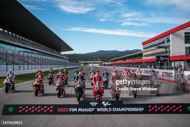 MotoGP class group photo on the starting grid ahead of the MotoGP Grande Prémio TISSOT de Portugal at Autodromo do Algarve on March 23, 2023 in...