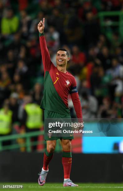 Cristiano Ronaldo of Portugal celebrates after scoring their sides first goal during the UEFA EURO 2024 qualifying round group J match between...