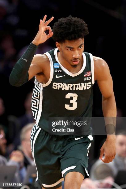 Jaden Akins of the Michigan State Spartans celebrates a three point basket against the Kansas State Wildcats during the first half in the Sweet 16...