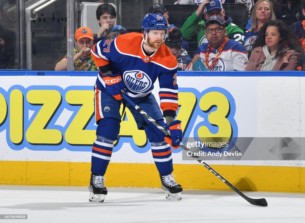 Brett Kulak of the Edmonton Oilers awaits a face-off during the game