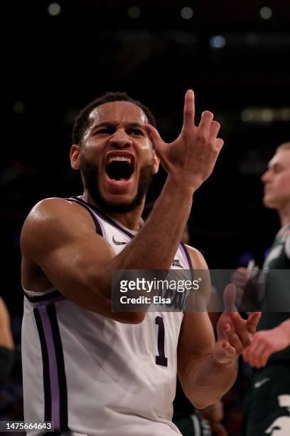 Markquis Nowell of the Kansas State Wildcats celebrates a basket against the Michigan State Spartans during the first half in the Sweet 16 round game...