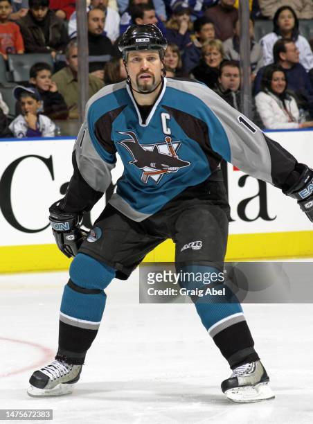 Owen Nolan of the San Jose Sharks skates against the Toronto Maple Leafs during NHL game action on December 21, 2002 at Air Canada Centre in Toronto,...