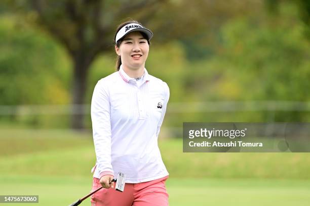 Asuka Ishikawa of Japan smiles after the birdie on the 10th green during the first round of AXA Ladies Golf Tournament in Miyazaki at UMK County Club...