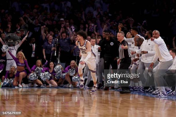 Ismael Massoud of the Kansas State Wildcats celebrates a basket against the Michigan State Spartans during overtime in the Sweet 16 round game of the...