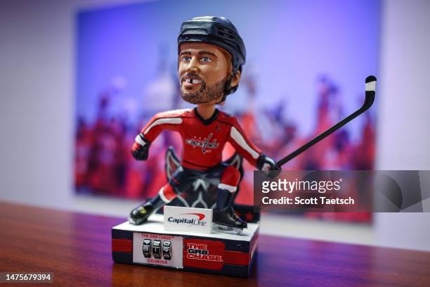 Bobblehead to honor Alex Ovechkin of the Washington Capitals for passing Gordie Howe for second place on the NHL's goal scoring list is seen during...