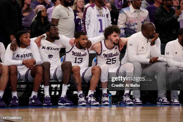 The Kansas State Wildcats bench reacts against the Michigan State Spartans during overtime in the Sweet 16 round game of the NCAA Men's Basketball...