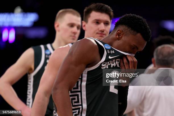 Tyson Walker of the Michigan State Spartans reacts after being defeated by the Kansas State Wildcats in overtime in the Sweet 16 round game of the...