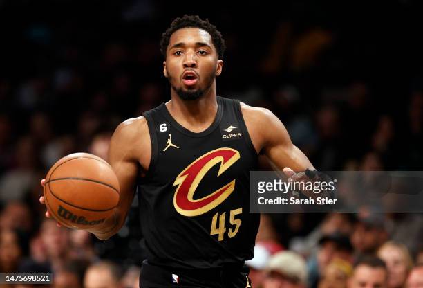 Donovan Mitchell of the Cleveland Cavaliers dribbles during the second half against the Brooklyn Nets at Barclays Center on March 23, 2023 in the...