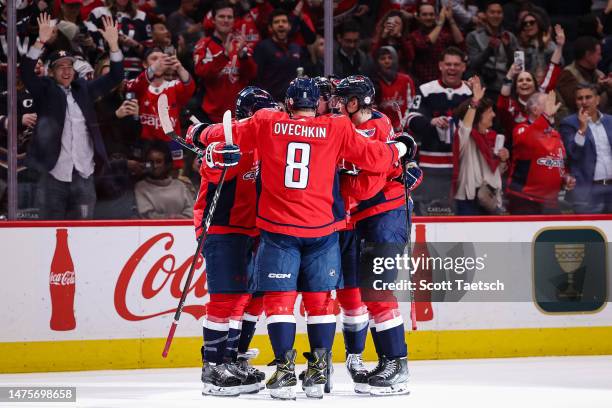 Alex Ovechkin of the Washington Capitals celebrates with teammates after a goal by Nick Jensen against the Columbus Blue Jackets during the second...