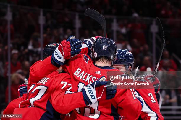 Sonny Milano of the Washington Capitals celebrates with teammates after scoring a goal against the Columbus Blue Jackets during the second period of...