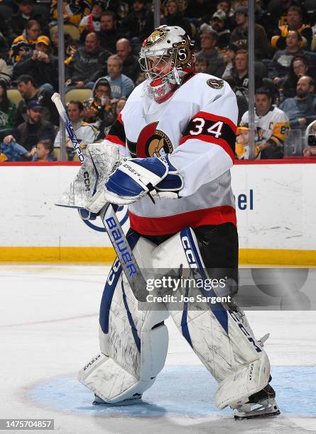 Dylan Ferguson of the Ottawa Senators defends the net against the Pittsburgh Penguins at PPG PAINTS Arena on March 20, 2023 in Pittsburgh,...