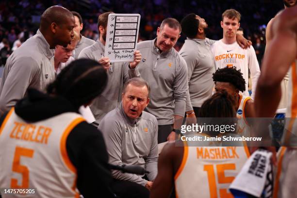 Head coach Rick Barnes of the Tennessee Volunteers speaks to his team during a timeout during the first half of the game against the Florida Atlantic...