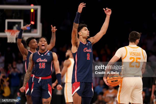 Nicholas Boyd and Alijah Martin of the Florida Atlantic Owls celebrate after defeating the Tennessee Volunteers in the Sweet 16 round game of the...