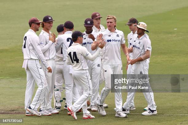 Will Sutherland of Victoria celebrates the wicket of Sam Whiteman of Western Australia during the Sheffield Shield Final match between Western...