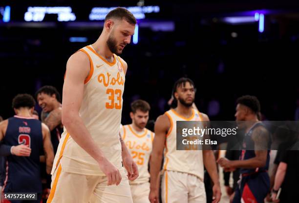 Uros Plavsic of the Tennessee Volunteers walks off the court after being defeated by the Florida Atlantic Owls in the Sweet 16 round game of the NCAA...