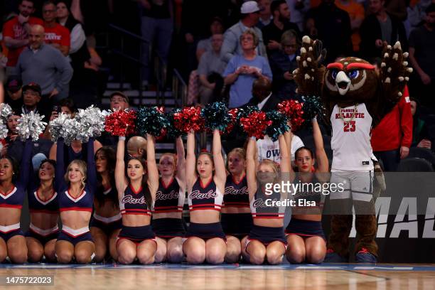 Florida Atlantic Owls cheerleaders and the mascot celebrate during the second half in the Sweet 16 round game of the NCAA Men's Basketball Tournament...