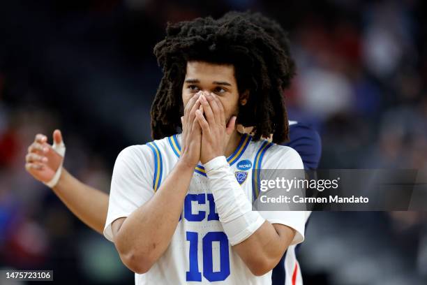 Tyger Campbell of the UCLA Bruins reacts to a play against the Gonzaga Bulldogs during the second half in the Sweet 16 round of the NCAA Men's...