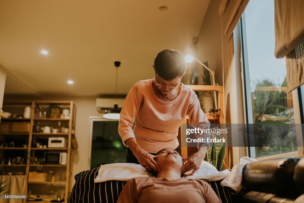 Therapy massage with senior massage therapist.