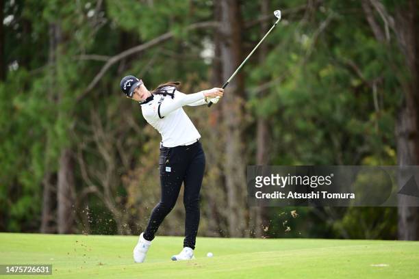 Asuka Kashiwabara of Japan hits her second shot on the 11th hole during the first round of AXA Ladies Golf Tournament in Miyazaki at UMK County Club...