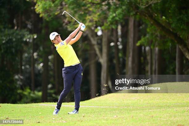 Mao Nozawa of Japan hits her second shot on the 11th hole during the first round of AXA Ladies Golf Tournament in Miyazaki at UMK County Club on...