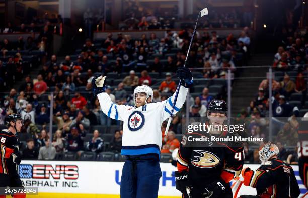Adam Lowry of the Winnipeg Jets celebrates a goal against the Anaheim Ducks in the third period at Honda Center on March 23, 2023 in Anaheim,...