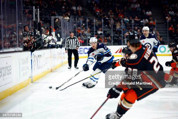 Mason Appleton of the Winnipeg Jets skates the puck against the Anaheim Ducks in the third period at Honda Center on March 23, 2023 in Anaheim,...