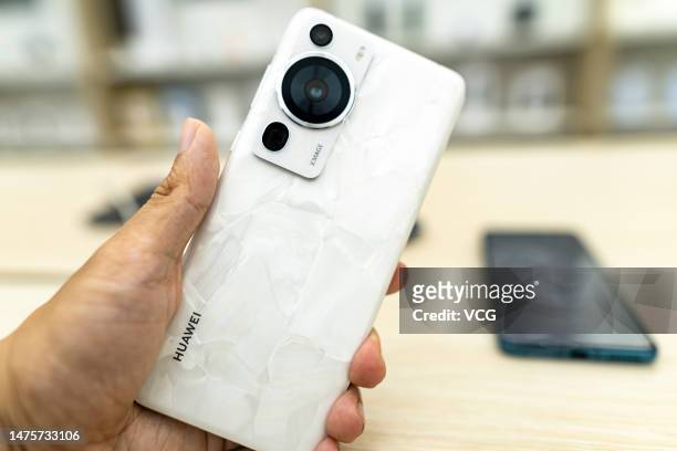 Huawei P60 Art smartphone is displayed for sale at a Huawei store on March 23, 2023 in Shaoxing, Zhejiang Province of China.