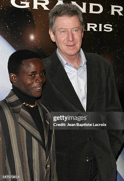 Lomama Boseki and Regis Wargnier during 13th Jules Verne Film Festival - "Man to Man" Premiere at Grand Rex Theatre in Paris, France.