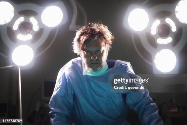 scary and evil doctor in surgery - black market bildbanksfoton och bilder