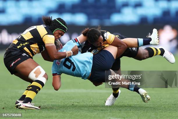 Layne Morgan of the Waratahs is tackled during the Super W match between NSW Waratahs Women and Western Force at Allianz Stadium, on March 24 in...