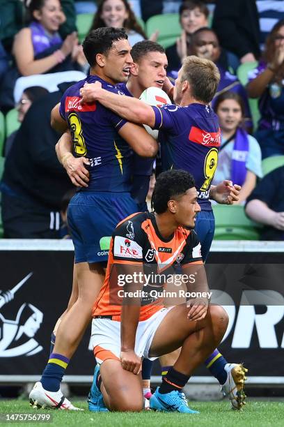 Will Warbrick of the Storm celebrates with team mates after scoring a try during the round four NRL match between the Melbourne Storm and Wests...