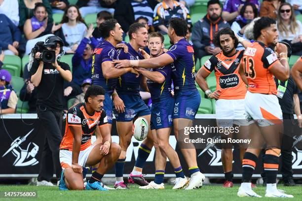 Will Warbrick of the Storm celebrates with team mates after scoring a try during the round four NRL match between the Melbourne Storm and Wests...