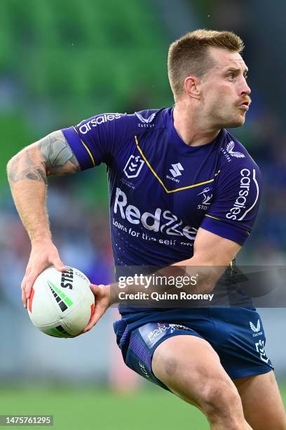 Cameron Munster of the Storm passes the ball during the round four NRL match between the Melbourne Storm and Wests Tigers at AAMI Park on March 24,...