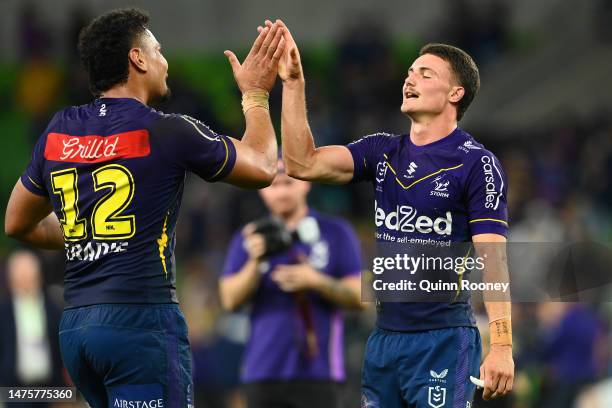 Jonah Pezet of the Storm and Eliesa Katoa of the Storm celebrate winning the round four NRL match between the Melbourne Storm and Wests Tigers at...