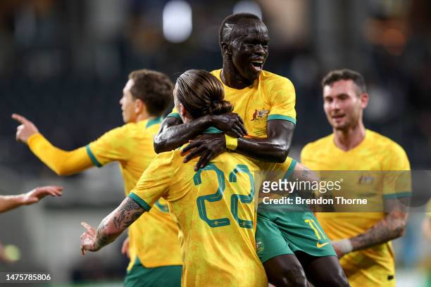 Jackson Irvine of Australia celebrates scoring a goal with team mates during the International Friendly match between the Australia Socceroos and...