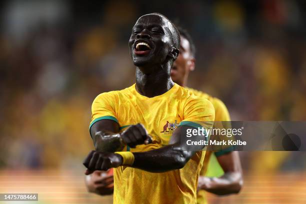 Awer Mabil of the Socceroos celebrates scoring a goal during the International Friendly match between the Australia Socceroos and Ecuador at CommBank...
