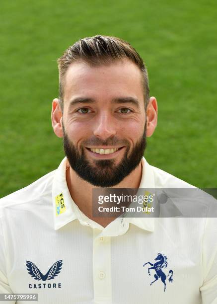 Jack Leaning poses for photographs during Kent CCC Photocall at The Spitfire Ground on March 24, 2023 in Canterbury, England.