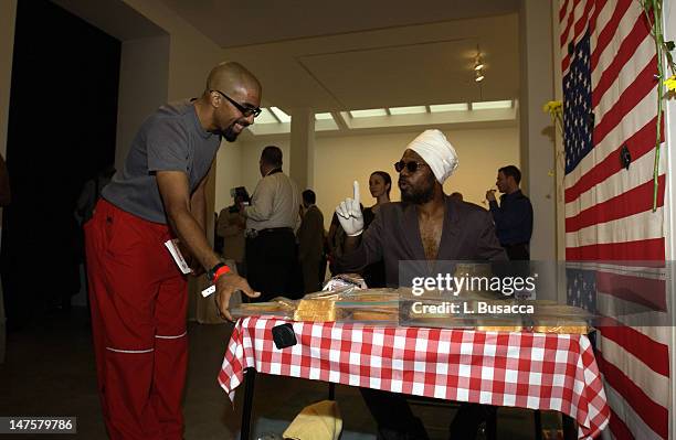 Dread Scott with William Pope.L during Trio's "Art & Outrage:The Exhibition" Opening at Robert Miller Gallery at Robert Miller Gallery in New York...