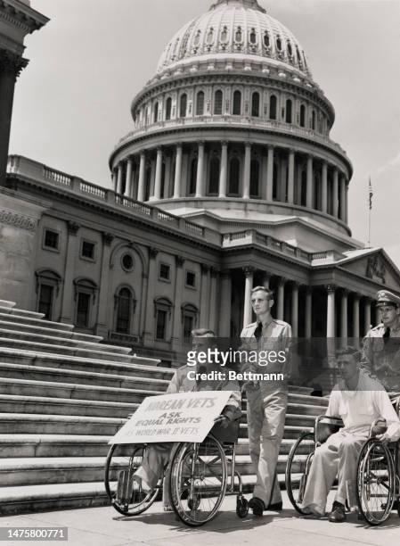 Korean War amputees from Walter Reed Army Hospital in Washington DC are shown in front of the capitol where they are protesting for equal rights with...