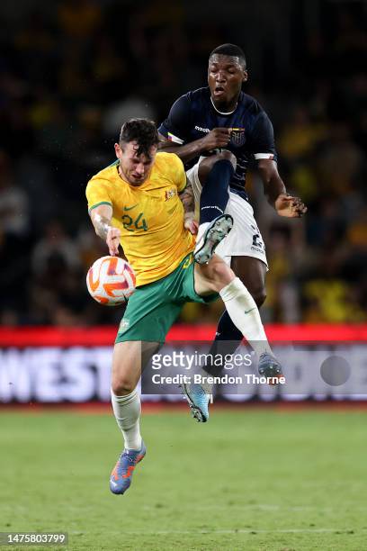 Aiden O'Neill of Australia competes with Moises Caicedo of Ecuador during the International Friendly match between the Australia Socceroos and...