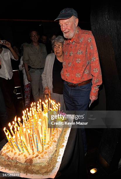 *Exclusive* Pete Seeger, with wife Toshi, blows out his birthday candles at the after party for the Clearwater benefit concert celebrating Pete...