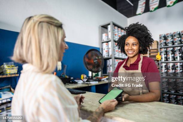 Paint Store Counter Paint Store Counter Photos and Premium High Res Pictures - Getty Images