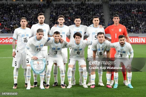 Uruguay players line up for the team photos prior to the international friendly match between Japan and Uruguay at the National Stadium on March 24,...