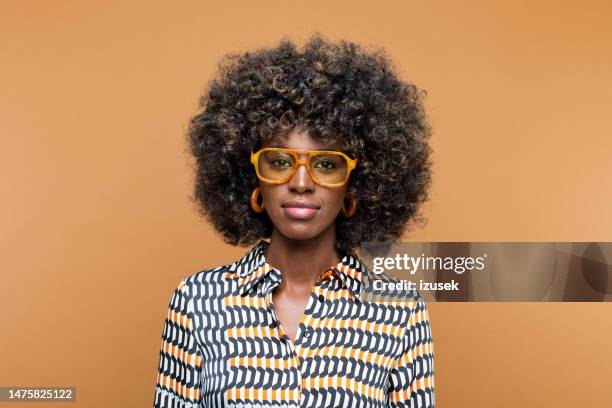 portrait of beautiful woman peeking at copy space - beige fashion stock pictures, royalty-free photos & images