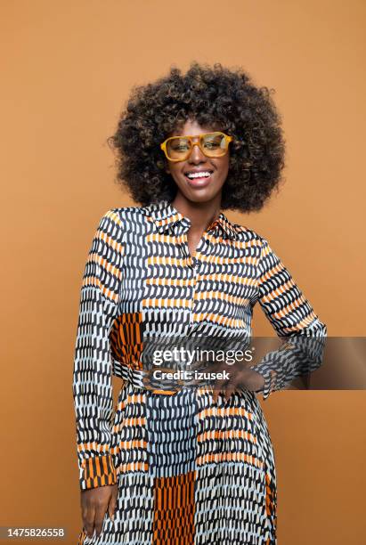 portrait of happy and fashionable woman - graphic print stock pictures, royalty-free photos & images