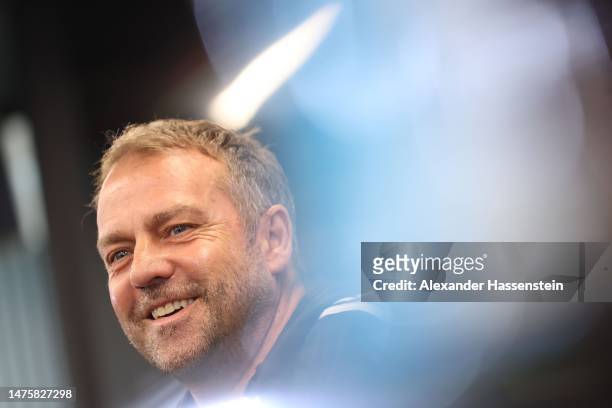 Hans-Dieter Flick, head coach of Germany smiles during a team Germany press conference at DFB-Campus on March 24, 2023 in Frankfurt am Main, Germany.