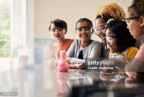 kids science, foam reaction and children experiment excited in a classroom having fun with learning. young scientist knowledge, assessment and helping with youth education research in a school class - school science project stock pictures, royalty-free photos & images