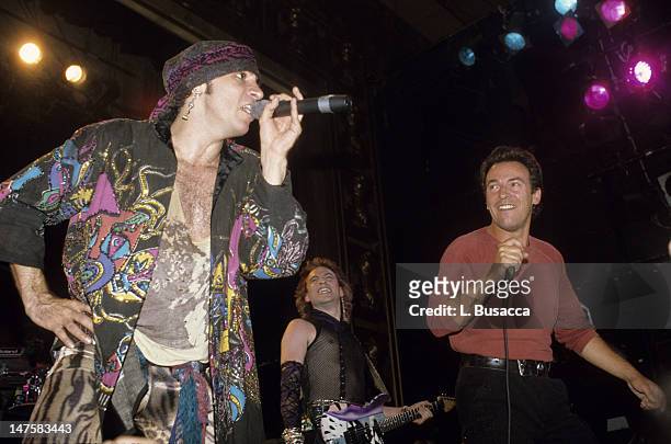 American musicians Steven Van Zandt and Bruce Springsteen perform in concert, New York, New York, circa 1991.