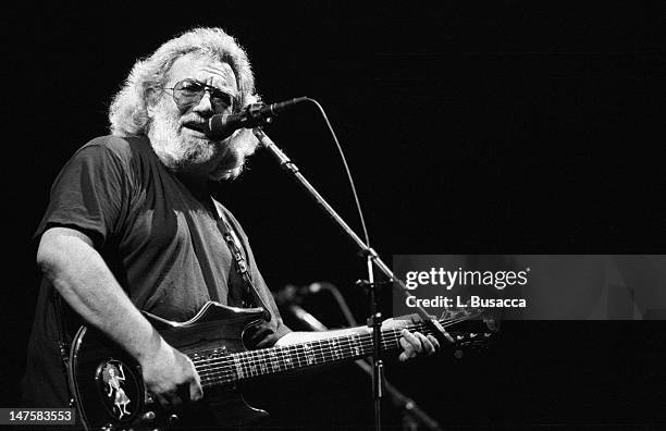 American musician Jerry Garcia, of the group the Grateful Dead, performs in concert, circa 1987.