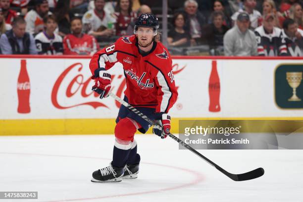 Rasmus Sandin of the Washington Capitals skates against the Chicago Blackhawks during the first period at Capital One Arena on March 23, 2023 in...